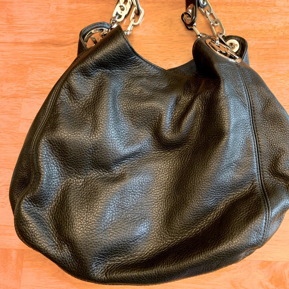 Michael Kors black leather handbag.